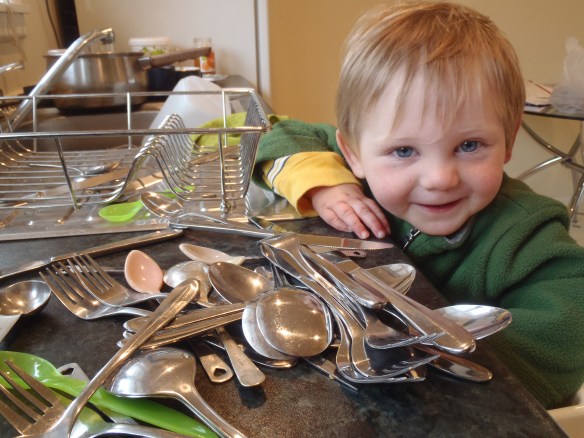MIILO PLAYING WITH SILVERWARE