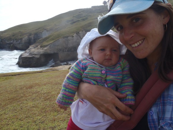 My charge at this beach was simpler--keep the immobile baby warm, shaded, fed and happy. Maybe I'll look back at these photos in a few years and see a family resemblance in our faces, but right now it's just too close for me to discern.