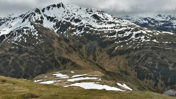 If you squint you might just be able to see the tiny hut in the saddle.  DOC calls it a "bivouac;" everyone else calls it a "biv" (three syllable words are too long for Kiwis).  That's where I planned to stay the night.