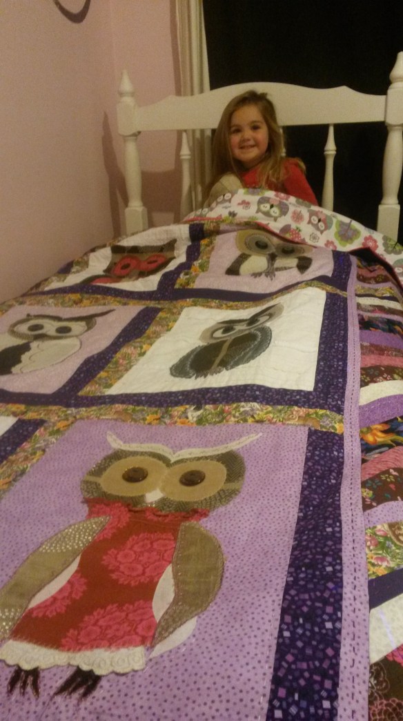 Naomi came prancing down the hall Wednesday morning. "Mommy, did you make me a big girl bed??" Tuesday night after she fell asleep, Jeremiah and I shoved aside her crib, set up her big girl bed, spread out the quilt I had made her, and tucked her beneath the covers. She sleeps like a rock, so her birthday morning surprise was to wake up in her new bed. She was ecstatic. 