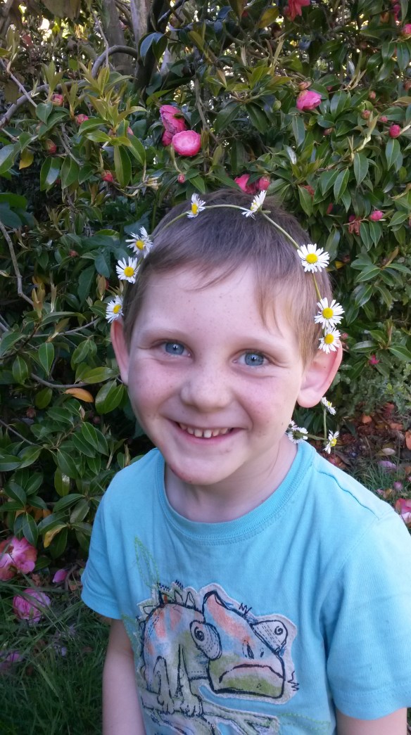 "Can you show me how to do a flower necklace like Chloe?"  He spent 30 minutes at least engrossed in the project, and was duly proud of the result.  