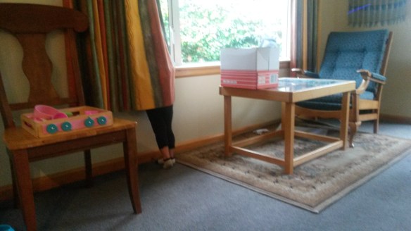 Legs below a curtain, that's a bit suspicious, no?