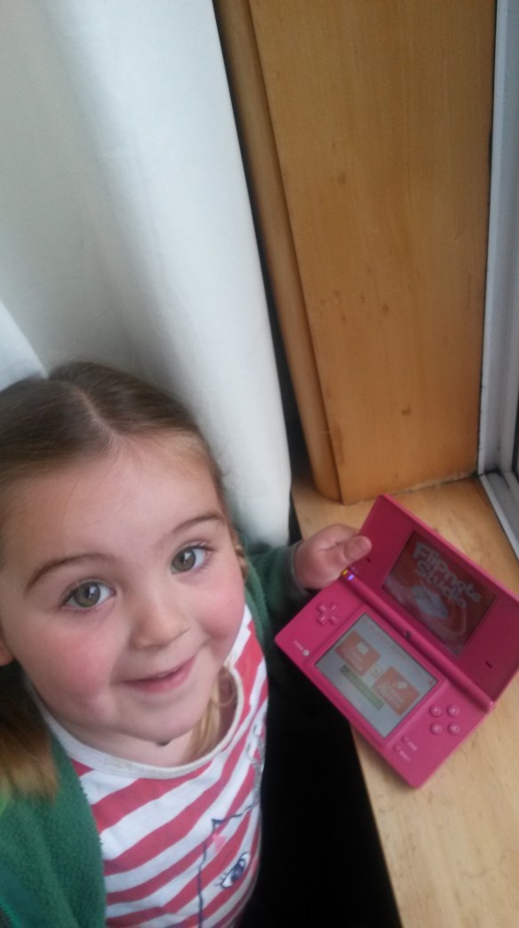 Cheerful electronic noises filter through the curtain. Naomi is ensconced with our friend's DS, illicitly playing video games. This is the first time I have noticed her being purposefully devious.