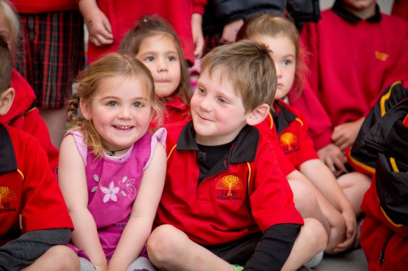 Read those expressions--Proud, Proud, Proud.  Milo's proud to be a big brother, herding his little sister around.  Naomi's proud to be included in the big kid photo.  