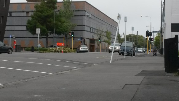 Then she stopped.  I don't know why.  Maybe she was tired?  Maybe she was just sick of me telling her to come along and wanted to assert her own decision-making ability.  I could SEE the library ahead, for crying out loud. I can't carry both her and her bike, so, needless to say, we both stopped.  For 30 minutes we stopped.  I sat down.  She pulled down her brows.  I weathered the concerned looks of well meaning passers by.  She cried.  I didn't cry (or yell)...a small victory for motherhood.  I observed a rich lady do an abominable job parking her fancy car.  Naomi stuck out her bottom lip.  I read national geographic on my phone.  Thank goodness for downloadable media!  Finally she moved again.