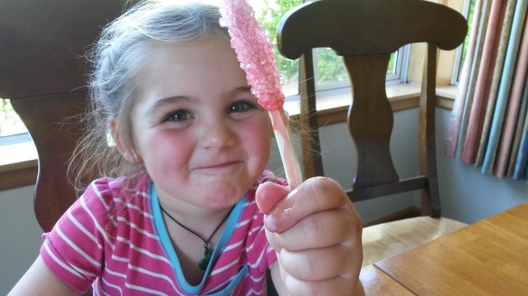 and pink ones for Naomi.  How stereotypical.   I think the idea of a super-saturated solution and seed crystals was lost on Milo and I'm SURE it was lost on Naomi.  Never mind.  Some day in science class the concept will be mentioned and hopefully they'll harken back to that summer afternoon when they crunched pure sugar off whittled maple sticks.  