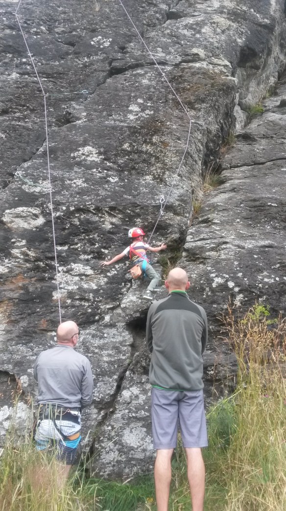 The next day was February 3rd, Milo's birthday (6!).  We got to the holiday house about 3 p.m.  This one would definitely NOT be classed as a bach.  It was pretty upscale, thanks to prior planning by a well organized member of our group.  Carrie and Ben (Stella's parents) were avid rock climbers before the advent of children (sigh), and they still have all their gear and much of their enthusiasm, so we make a quick pizza for the kids and headed out to the rocks.  Milo gave it a good go, and was sure proud to dust his fingers with the chalk like the pros.  